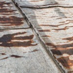 roof restoration before and after Byron Bay terracotta tiles