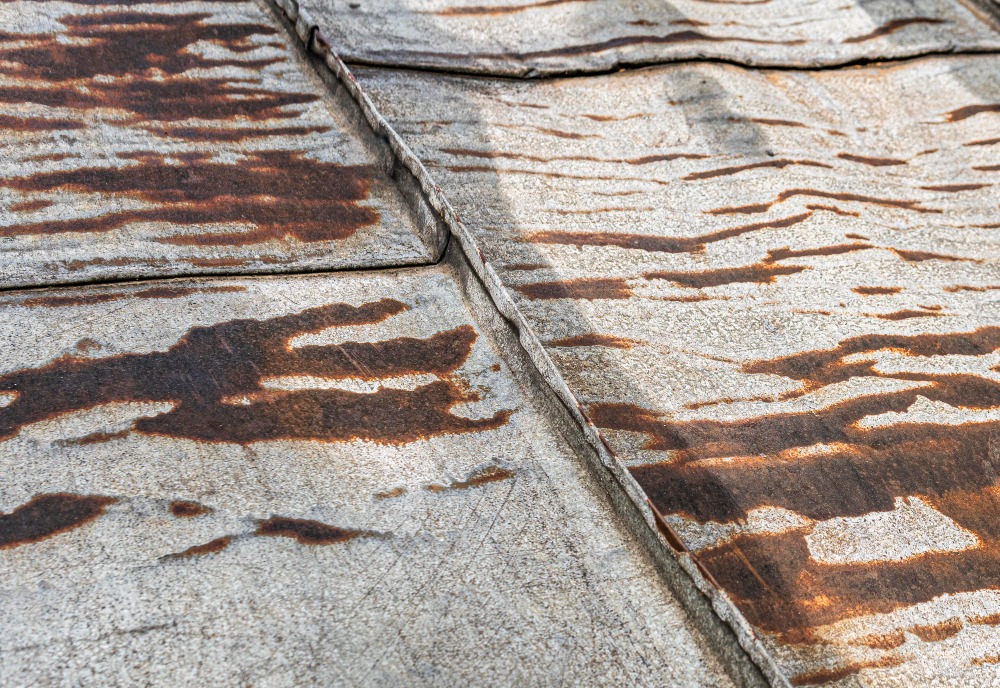 roof restoration before and after Byron Bay terracotta tiles