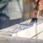 Professional roof painting being applied to a tile roof in Mullumbimby NSW