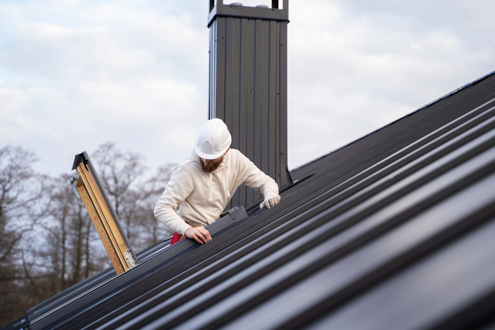 Roof repairs in Ballina showing damaged tiles and ridge caps on a Northern Rivers NSW home