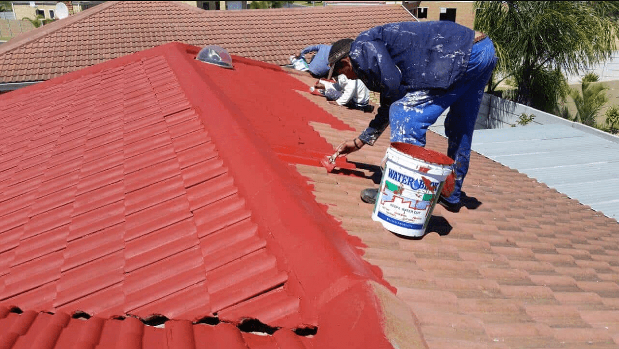 Professional roof painters preparing a house in Tweed Heads with thorough roof pressure cleaning Pottsville before applying coastal grade paint.